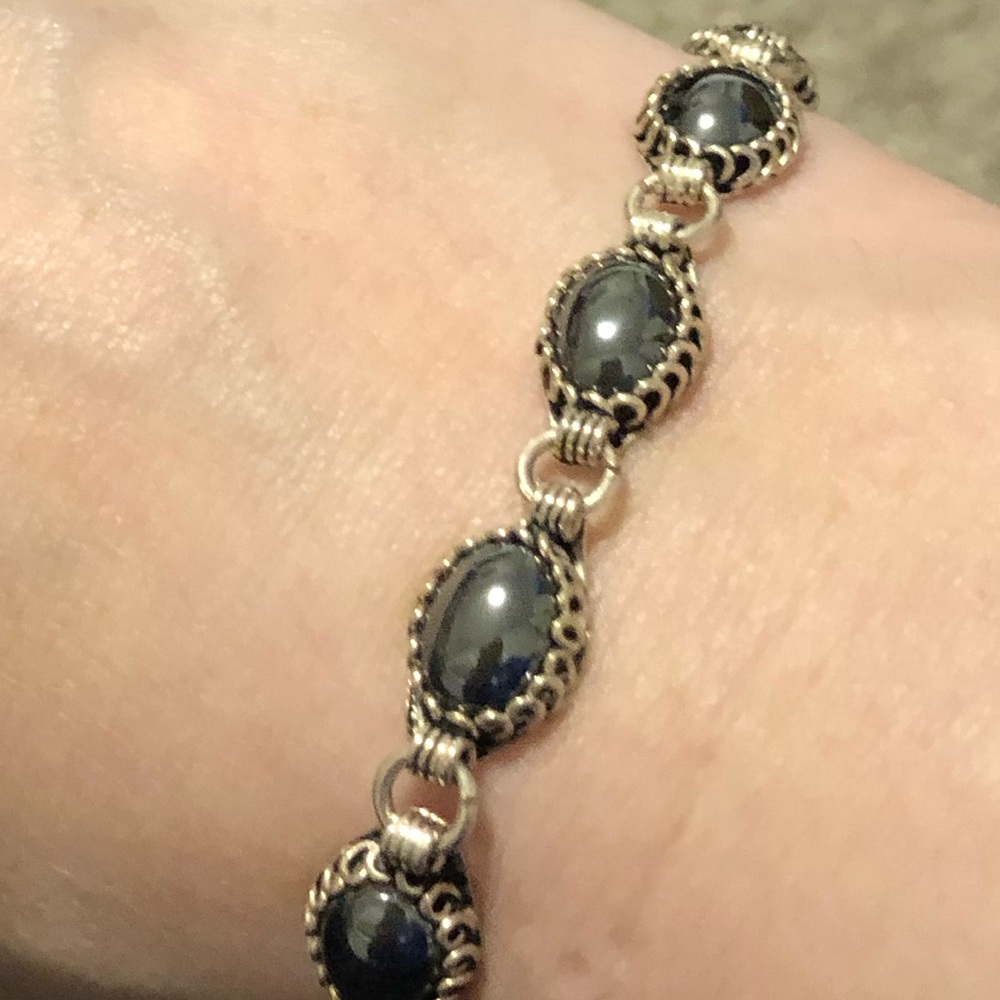 Silver bracelet.